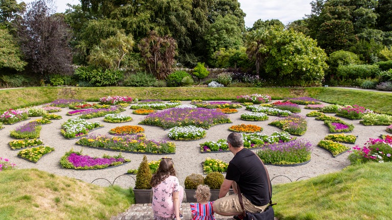 A family by the Sunken Garden at Castle Ward, Co Down